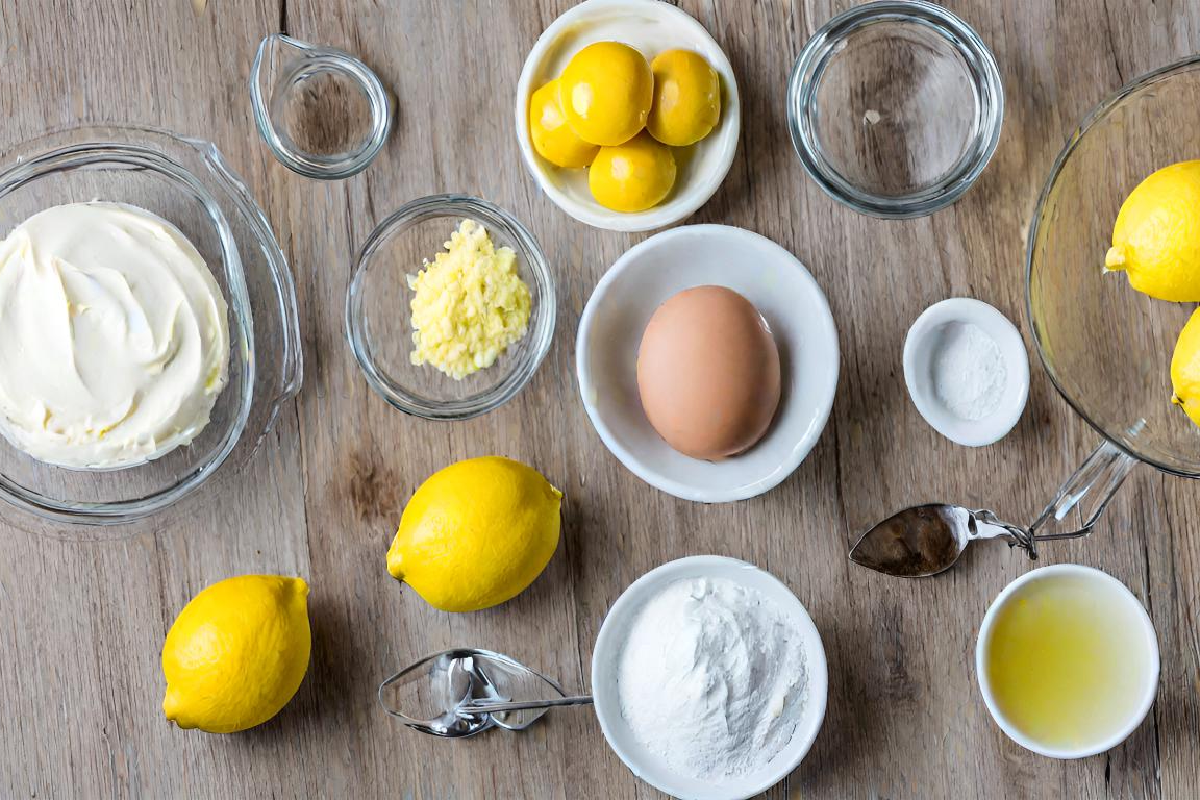 Key ingredients for Easy Lemon Squares laid out on a table