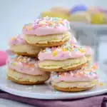 easter whoopie pies on a white plate with pink and yellow sprinkles