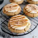 salted caramel cheesecake cookies with frosting on top