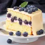 Don't miss out on this lemon dessert! Your Easter dessert ideas won't be complete without the BEST Lemon Blueberry Cake. Loaded with fruit and layered with lemon curd and mascarpone frosting, this lemon cake is an easy spring recipe you'll want to ma...
