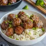 the meat is covered in sauce and garnished with parsley