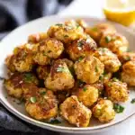 Two images showcasing the Vegan Lemon Pepper Glazed Cauliflower Recipe. The first image features the finished dish, glistening with a tasty glaze, while the second image shows the cooking process with spices. A zesty, healthy recipe for plant-based m...