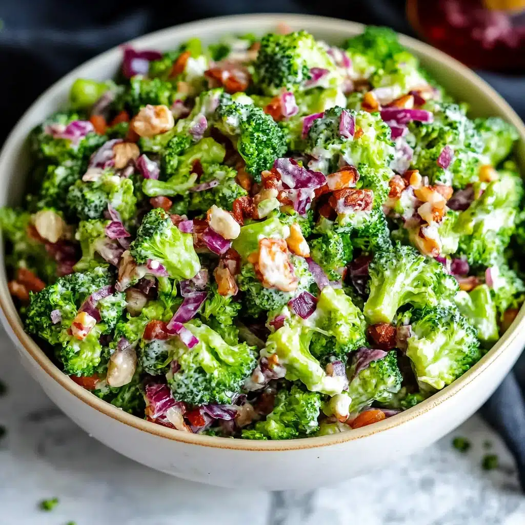 This Broccoli Salad is an Easter side dish recipe made with fresh broccoli, smoked bacon, red onion, and sliced almonds in a slightly sweet mayo base. This salad recipe is also a great addition to your Spring salad ideas!