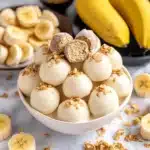 banana pudding truffles on a white plate with the words, bite - sized