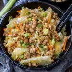 An instructional step-by-step video showing how to make a low-carb and keto Egg Roll in a Bowl recipe.