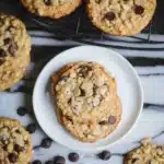 rice krispie chocolate chip cookies are cooling on the rack with text overlay that reads rice krispie chocolate chip cookies