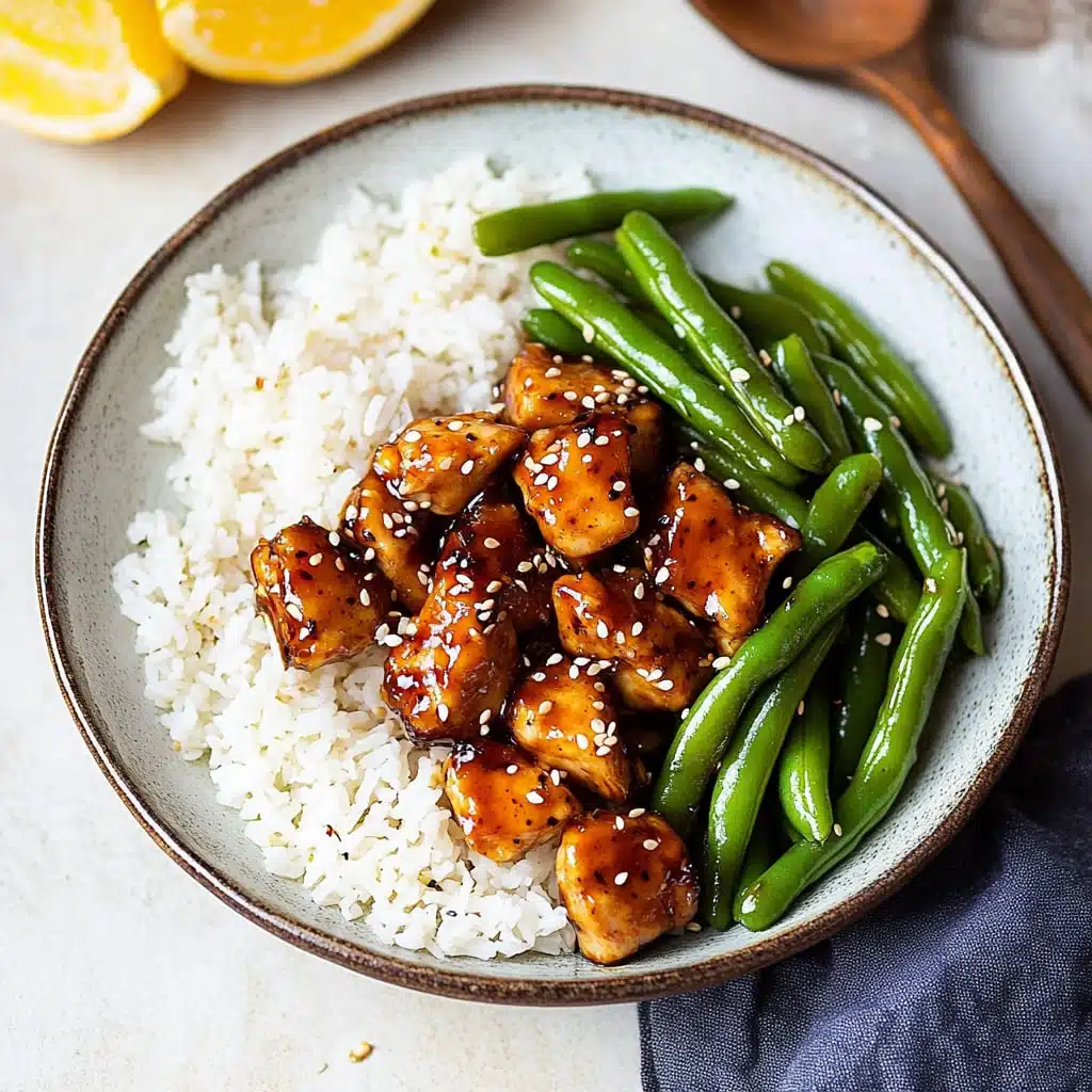 two plates filled with chicken and green beans