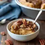 pecan pie pudding cake in a white bowl