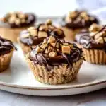 mini chocolate peanut butter pies stacked on top of each other with text overlay