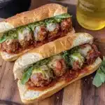 two pictures of meatball subs with cheese and sauce on them, one is cut in half