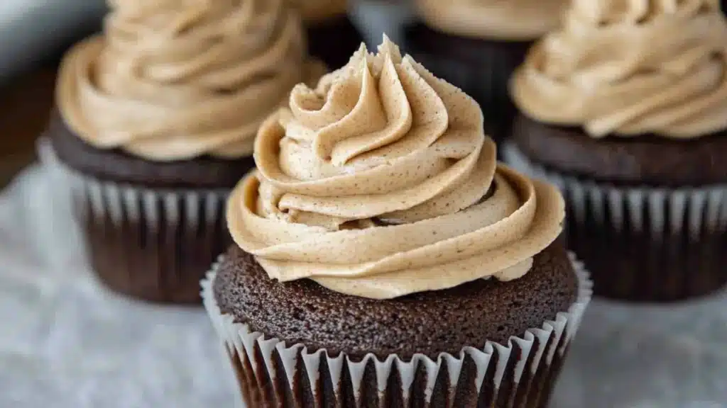 chocolate cupcakes with coffee buttercream on top