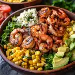 the shrimp is being drizzled with dressing