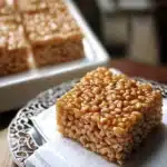 brown butter, dulce de leche rice krispie treats are stacked on top of each other