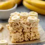 banana pudding rice krispies are stacked on top of each other