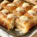 king's hawaiian cheesecake danish with icing on top and other ingredients around it