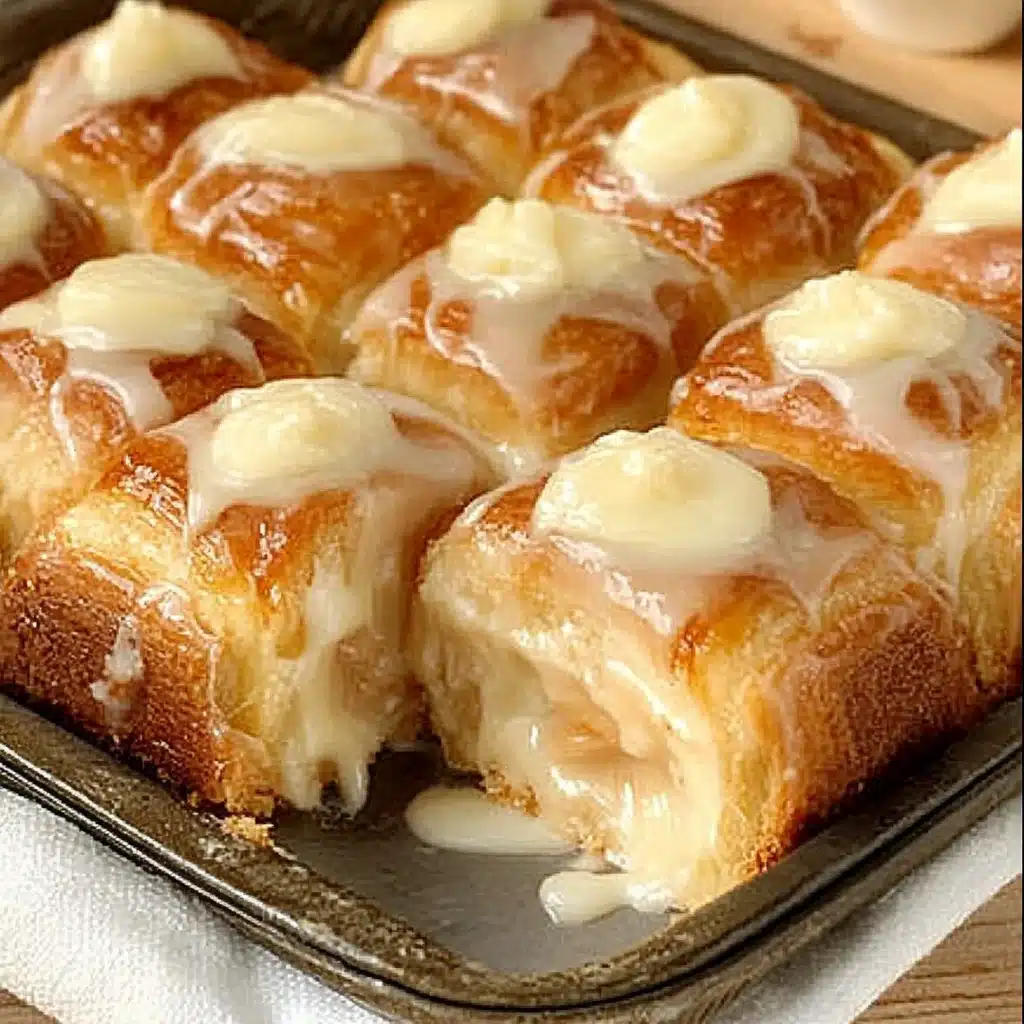 king's hawaiian cheesecake danish with icing on top and other ingredients around it