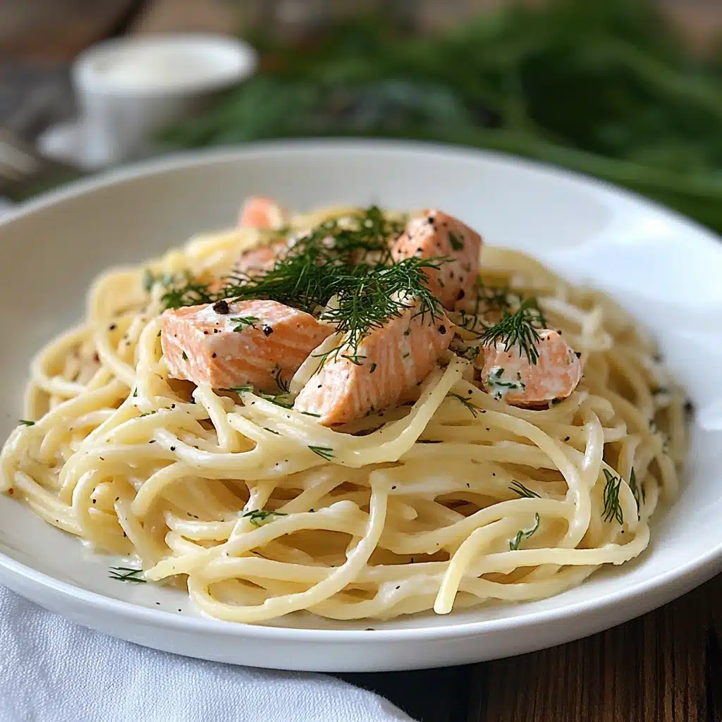 lemon dill salmon pasta on a plate with text overlay