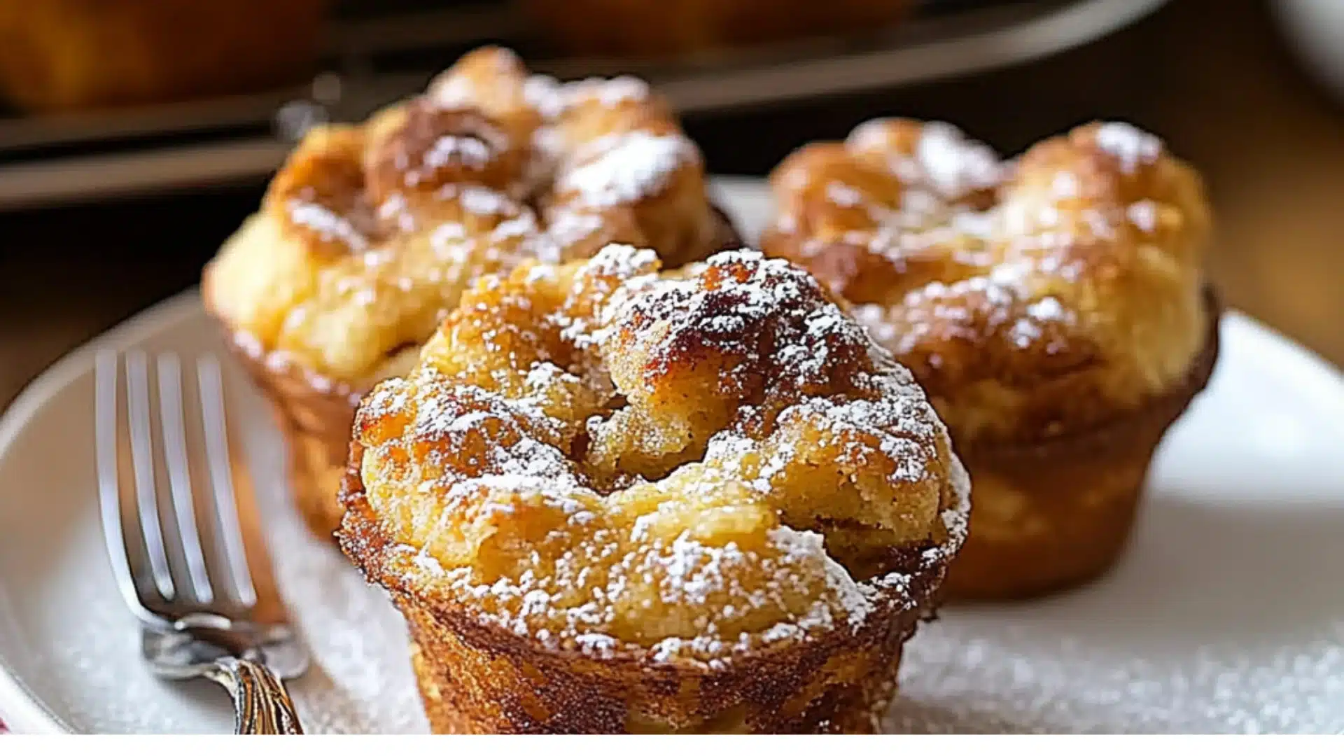 french toast muffins on a white plate with powdered sugar and the words quick & delicious