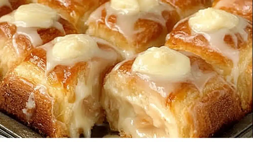 king's hawaiian cheesecake danish with icing on top and other ingredients around it